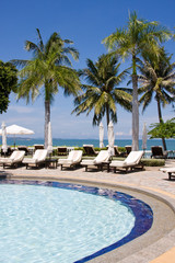 Swimming pool on a sunny day.Pattaya city in Thailand