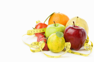 Group fruits with measuring tape