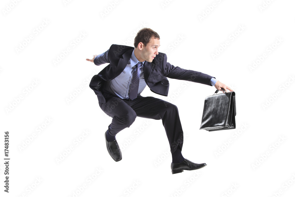 Poster young businessman with a briefcase jumping