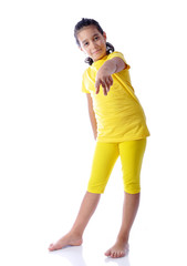 Beautiful cute girl in yellow clothes isolated