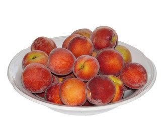 Ripe peaches in plate