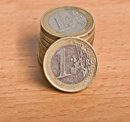 Euro coins on desk