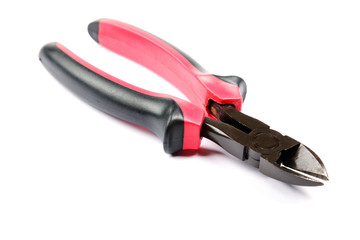 Obraz premium Red with black cutting pliers isolated on white background.