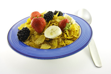 Cornflakes and Fruit in a Blue Bowl with Spoon
