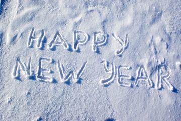 "Happy New Year" written on the snow.