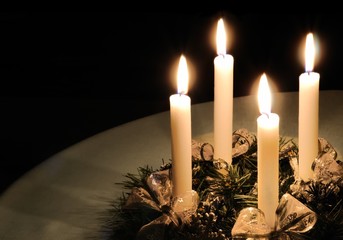 Christmas advent wreath with burning candles