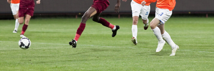 Obraz premium Soccer players fighting for the ball