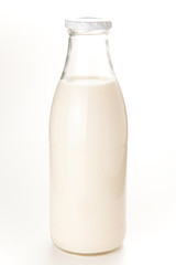 Fresh glass of milk isolated over white