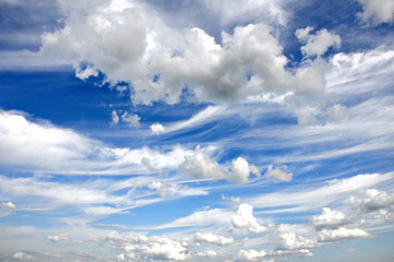 cumulus clouds and a blue sky