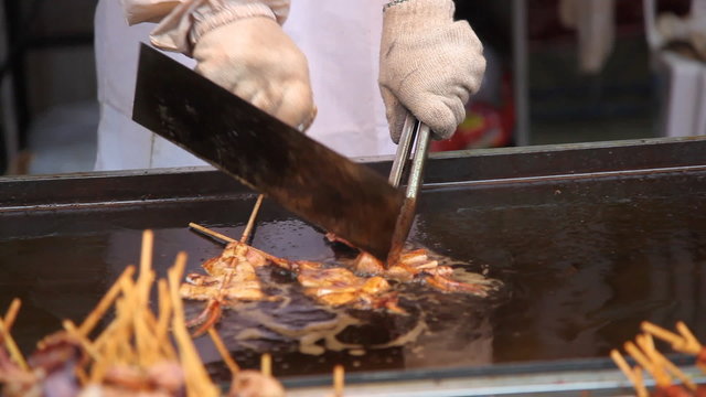 Roasting  squid shashlik