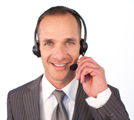 Businessman with a headset on talking