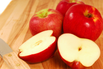 Fresh apples on a cutting board