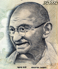 Part of 100 Indian rupees banknote with Mahatma Gandhi