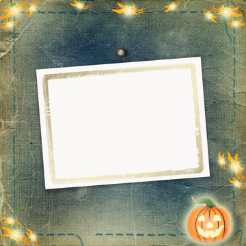 Frame for photo with pumpkin and flowers on the nightly backgrou