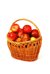Fototapeta na wymiar fresh apples in basket isolated on white