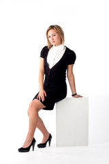 woman sitting on white board