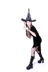 Young witch on halloween night