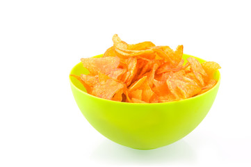 Green bowl with paprika chips