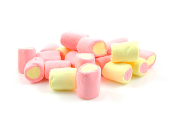 stack of colorful marshmallows over white background