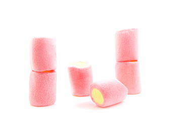stack of colorful marshmallows over white background