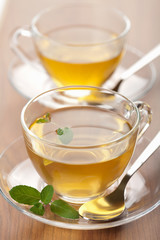 two cups of green tea with mint