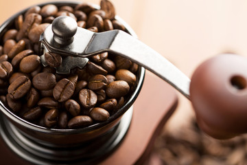 roasted coffee beans in grinder
