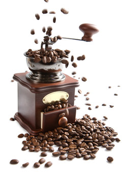 Coffee Beans Falling Into Grinder Isolated