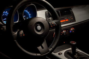 Sports car interior with dramatic nighttime lighting