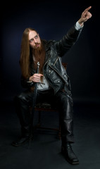 Young man point at upper right corner