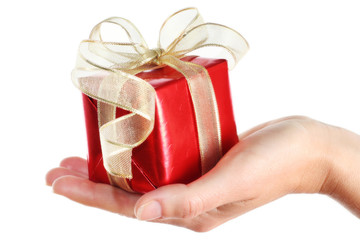 Red gift box in woman's hand