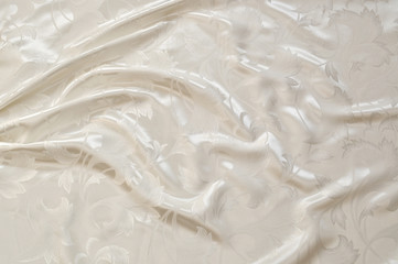 Naklejka na ściany i meble Drape background of white satin