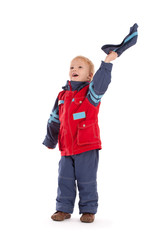 Happy boy wave of the hand with hat