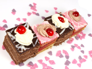 Delicious cakes on white background