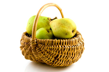 Fresh pears in wooden basket