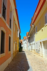 Fototapeta na wymiar A narrow street in Lisbon, Portugal