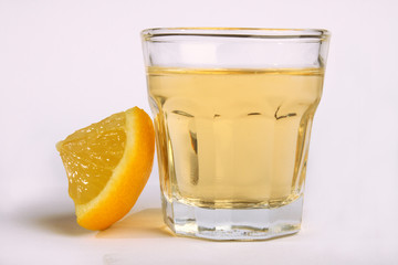 Tequila shot with lemon
