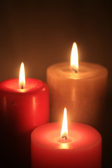 group of three burning candles