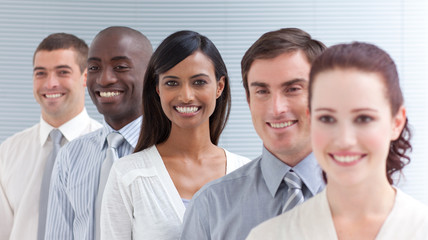 Business team in a line. Focus on a Indian woman