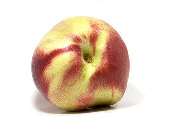 single peach in close up