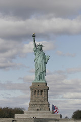 Fototapeta premium Liberty Statue viewed from New York City Lower Manhattan