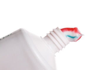 Toothpaste squeezed out of the tube isolated on white