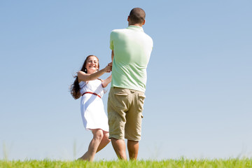 young couple paly at park