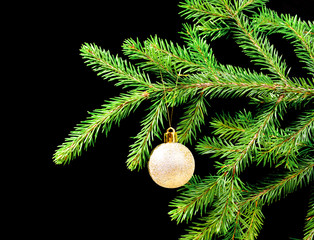Fototapeta na wymiar Christmas tree ornaments on dark
