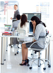 Obraz premium Businesswoman getting bored in a presentation