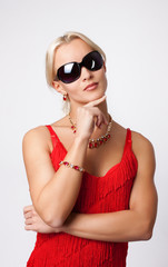 Sexy blond girl in red dress