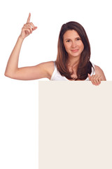 Beautiful woman holding board, first finger up