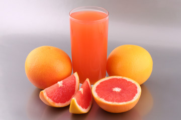 Grapefruit juice and ripe grapefruits