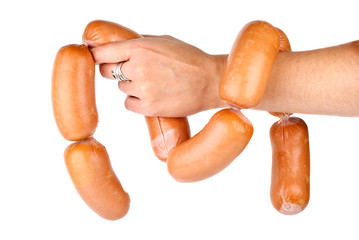 Hand holding sausages chain isolated on the white background