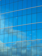 Fototapeta na wymiar Exterior glass wall of modern office building