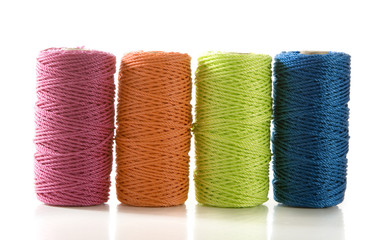 four assorted cord spools
